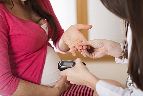 Pregnant Woman Doctor Checking Blood Sugar Level